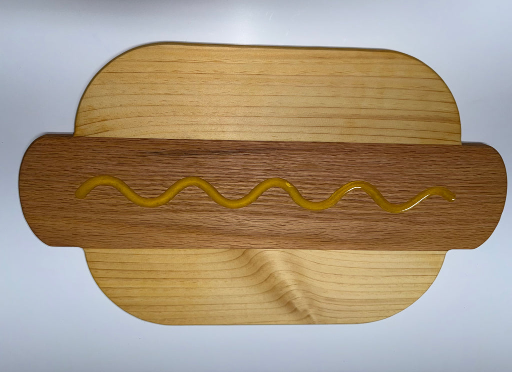 Hot dog shaped cutting board - oak bun with mustard squiggle