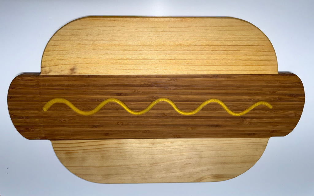 Hot dog shaped cutting board - bamboo with mustard squiggle