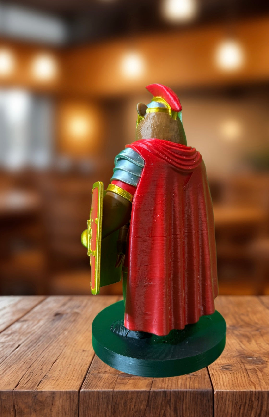 Roman soldier bear figurine side view showing sword and armor detail