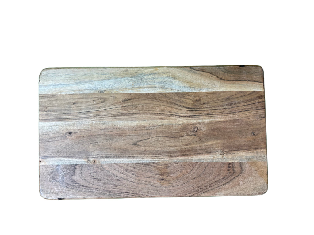 Top view of rustic hardwood cutting board showing natural wood grain
