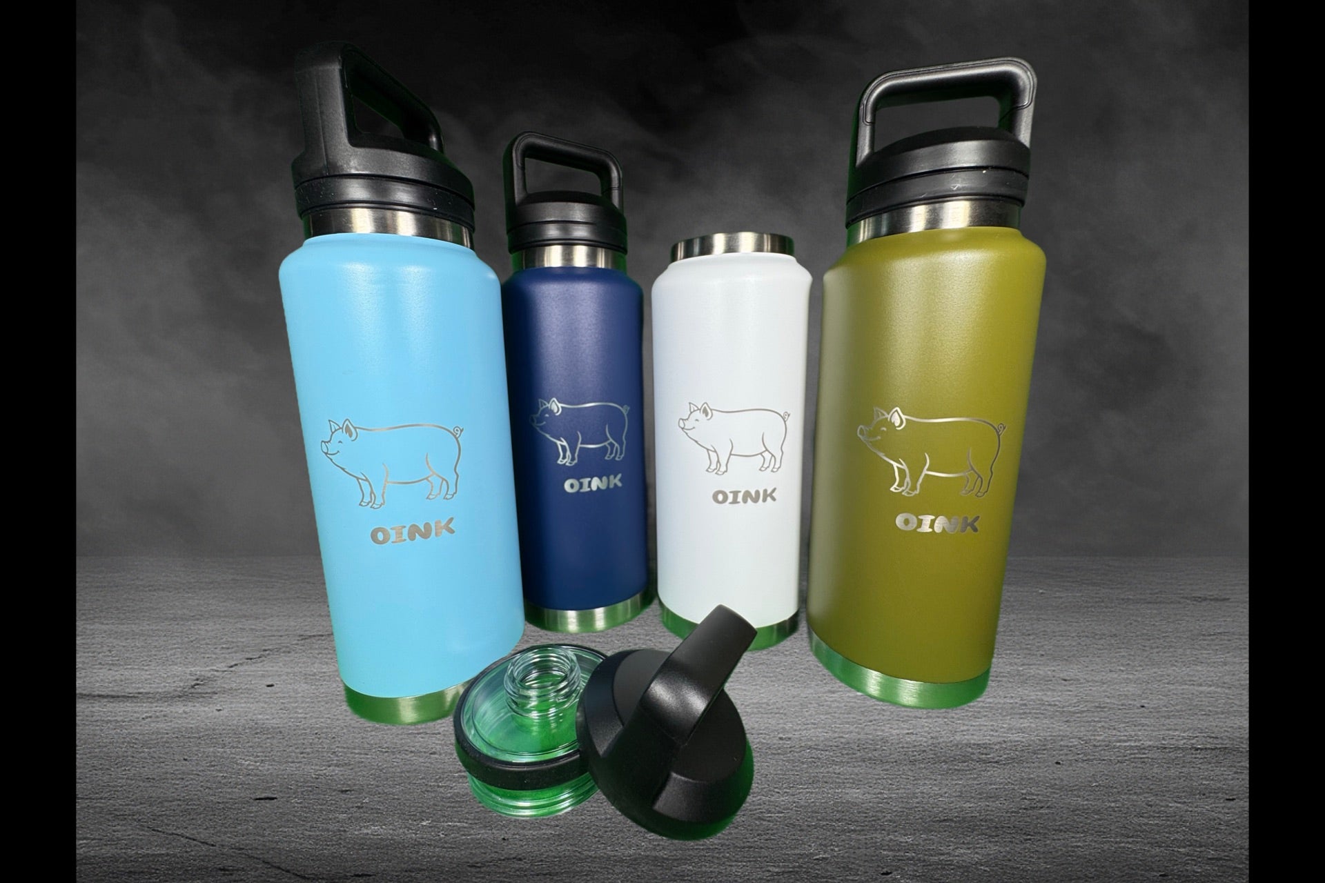 All four OINK laser-etched powder coated 40 oz water bottles in sky blue, navy, white, and olive green