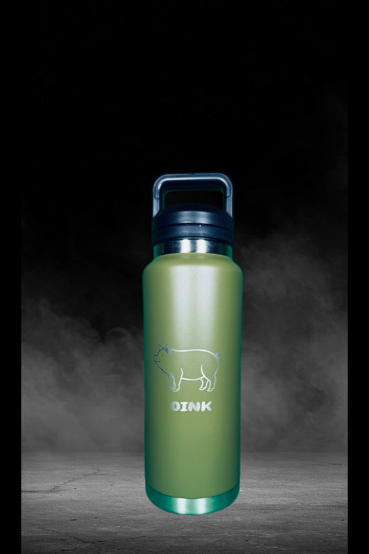 OINK laser-etched 40 oz water bottle in navy blue with carry handle lid and green accent base