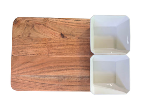 Acacia wood charcuterie board with 2 white ceramic bowls, top view