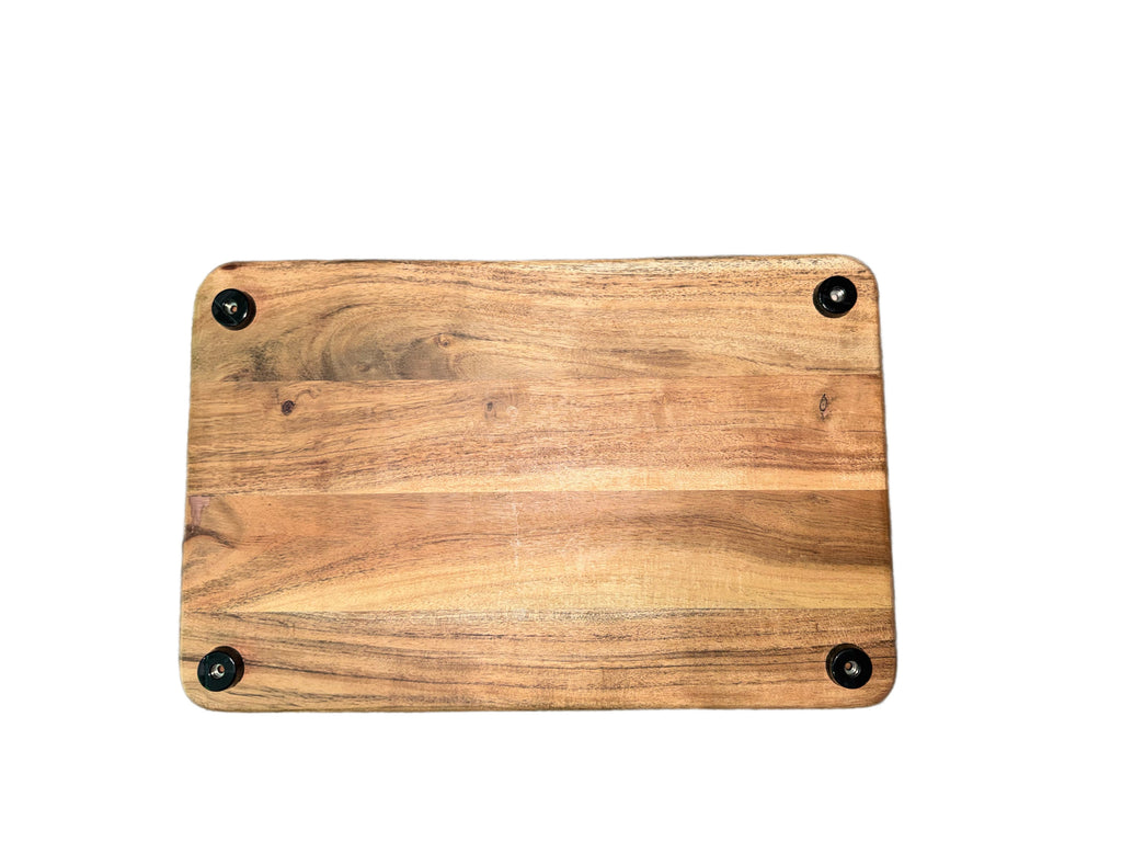 Bottom of acacia wood charcuterie board showing 4 rubber feet